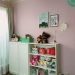 ピンクの壁がポイントのキュートな子ども部屋